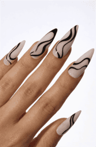 Long almond nails with nude base and flowing black abstract wave lines, minimalist modern design with glossy finish and soft neutral tones