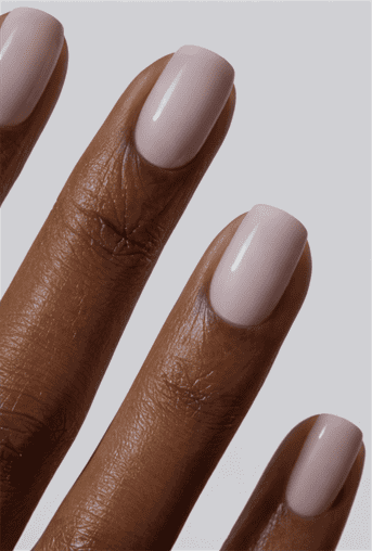 Short square nails with soft milky pink nude polish, glossy finish with clean minimal aesthetic, natural everyday manicure look