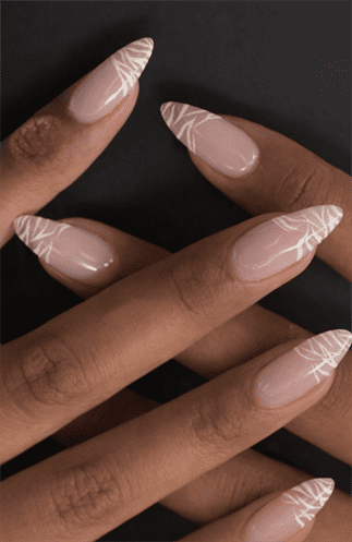 Almond-shaped nails with nude base and fine white zebra stripe detailing on tips, glossy finish with subtle animal print and modern minimalist nail design