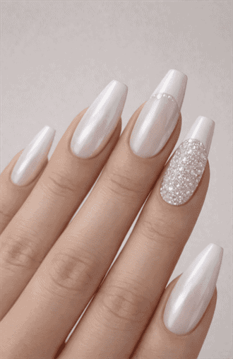 Long coffin nails with white pearl chrome finish and crystal accent nail, high-shine iridescent glow with luxury statement manicure style