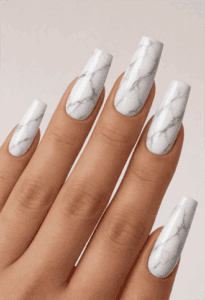 Long square nails with white marble pattern and soft grey veining, glossy finish with clean stone-inspired minimalist nail design