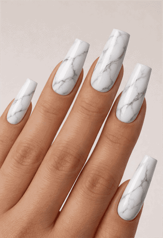 Long square nails with white marble pattern and soft grey veining, glossy finish with clean stone-inspired minimalist nail design