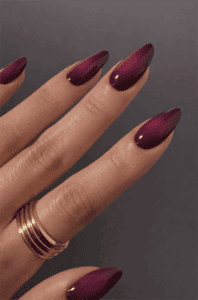 Burgundy purple ombre almond nails with glossy gradient fade, dark wine color nail design on long nails