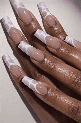 Lilac patterned French tip coffin nails with nude base, glossy long acrylic nails with abstract print design