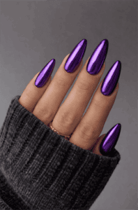 Purple chrome almond nails with mirror metallic finish, glossy long nail design in vibrant violet shade