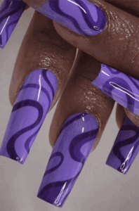 Purple swirl coffin nails with glossy finish, abstract wave nail design on long square acrylic nails