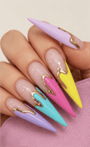Abstract pastel drip stiletto nails with gold chrome accents, colorful glossy nail design on nude base