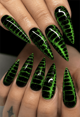 Black and neon green reptile stiletto nails with crocodile texture effect, glossy animal print nail design on long pointed nails