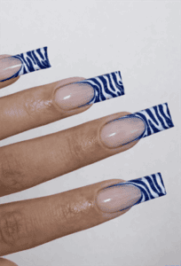 Blue zebra print French tip square nails with nude base, glossy animal print nail design on long nails