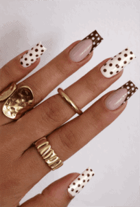 Brown polka dot French tip nails with nude base, glossy square acrylic nails with chocolate dot design