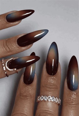 Burgundy aura chrome almond nails with glossy gradient fade, dark red and blue iridescent nail design