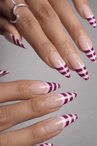 Burgundy and pink striped French tip stiletto nails with nude base, glossy long nail design