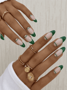 Emerald green double French tip almond nails with nude base, elegant minimalist nail design featuring glossy green accents