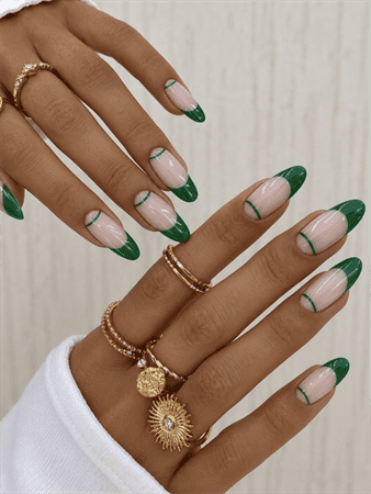 Emerald green double French tip almond nails with nude base, elegant minimalist nail design featuring glossy green accents