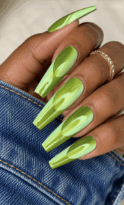 Glossy lime green swirl coffin nails with abstract 3D illusion design, vibrant acrylic nail art on long square nails