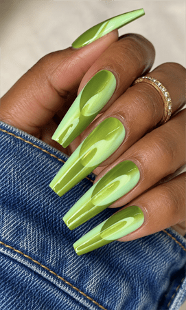 Glossy lime green swirl coffin nails with abstract 3D illusion design, vibrant acrylic nail art on long square nails