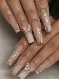 Gold marble butterfly coffin nails with white stone effect, rose gold foil accents and 3D crystal butterfly nail art