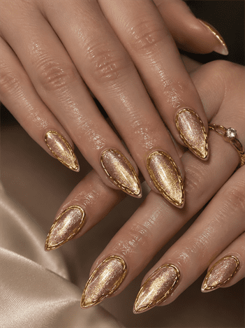 Gold velvet chrome almond nails with metallic cat eye shimmer, luxury nail design featuring gold outline accents and glossy finish