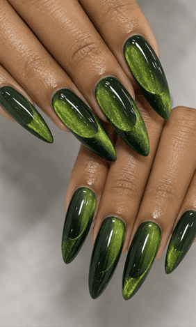 Emerald green cat eye almond nails with magnetic shimmer effect, glossy metallic nail design on long almond nails