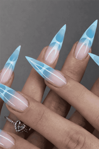 Icy blue aura stiletto nails with nude base, glossy gradient nail design with abstract swirl accents