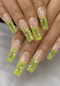 Lime green jelly coffin nails with rhinestone accents, translucent neon French tip nail design on long square acrylic nails
