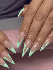Mint green flame French tip stiletto nails with nude base, glossy minimalist nail design on long pointed nails
