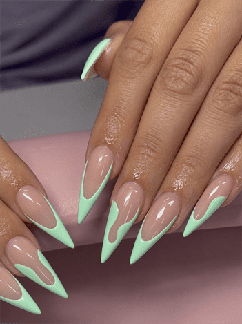Mint green flame French tip stiletto nails with nude base, glossy minimalist nail design on long pointed nails