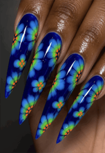 Neon blue floral aura stiletto nails with glowing flower nail art, vibrant airbrush nail design on long pointed nails
