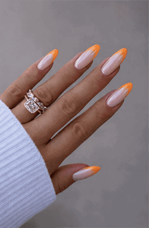 Neon orange chrome French tip almond nails with nude base, glossy metallic tip nail design