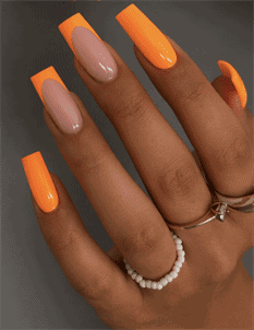 Neon orange French tip coffin nails with nude base, glossy long acrylic nail design