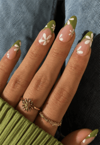 Olive green daisy French tip almond nails with white floral accents, glossy spring nail design on nude base