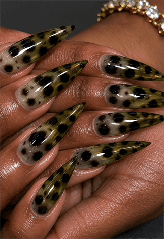 Olive tortoiseshell jelly stiletto nails with translucent animal print design, glossy luxury nail art on long pointed nails