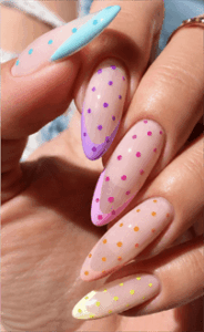 Pastel polka dot French tip almond nails with nude base, glossy colorful dotted nail design
