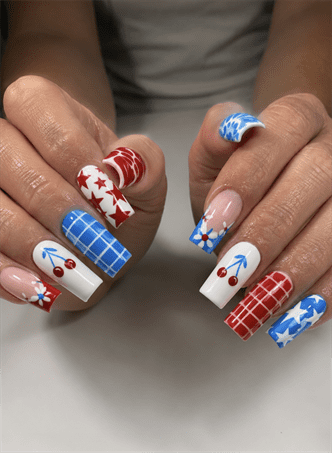 Patriotic pop art coffin nails with red, white and blue star, cherry and plaid nail designs