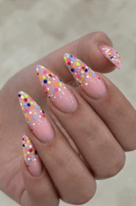Rainbow confetti glitter almond nails with nude pink base, colorful glossy glitter nail design
