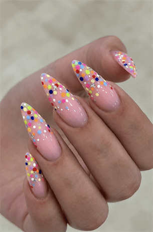 Rainbow confetti glitter almond nails with nude pink base, colorful glossy glitter nail design
