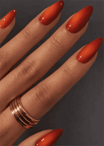 Red to orange ombre almond nails with glossy finish, fiery gradient nail design on long nails