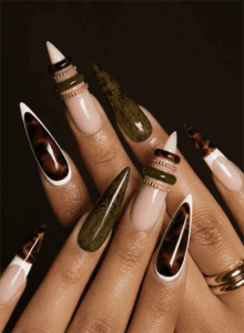 Tortoiseshell and olive green stiletto nails with glossy finish, earthy animal print nail design on nude base