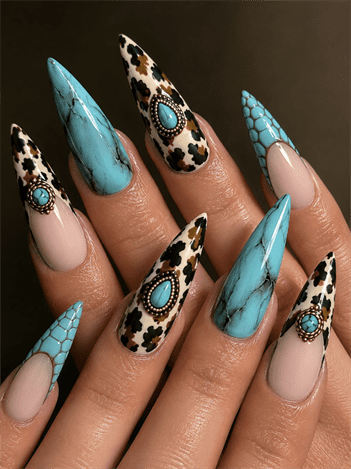 Turquoise western stiletto nails with cow print accents, gemstone nail art and desert-inspired nail design on nude base