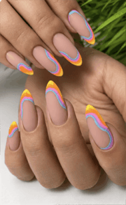Wavy pastel French tip almond nails with nude base, colorful swirl nail design in pink, blue and yellow