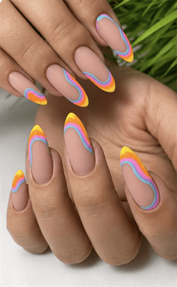 Wavy pastel French tip almond nails with nude base, colorful swirl nail design in pink, blue and yellow