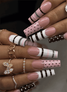 Y2K pink stripe and polka dot coffin nails with glossy finish, retro mixed pattern nail design on nude base