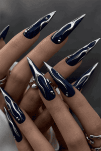 Midnight blue chrome flame stiletto nails with silver metallic accents, glossy high-shine finish and futuristic luxury nail design