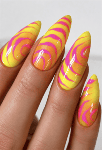 Neon yellow and hot pink swirl almond nails with retro abstract nail art, glossy psychedelic manicure and bold summer design