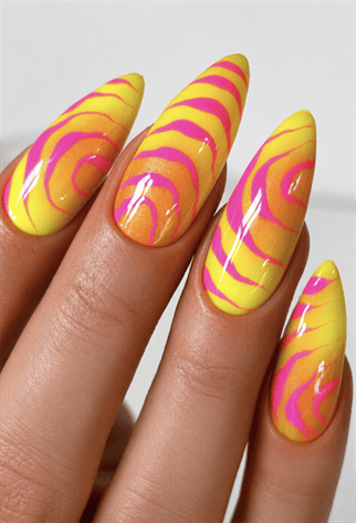 Neon yellow and hot pink swirl almond nails with retro abstract nail art, glossy psychedelic manicure and bold summer design