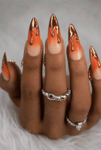 Orange ombré chrome drip stiletto nails with molten rose gold metallic French tips, glossy sunset gradient and luxury nail design
