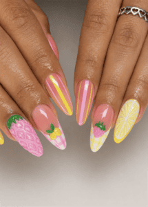 Pink fruit almond nails with strawberry, lemon, pineapple and pastel striped nail art, glossy summer manicure featuring playful tropical designs