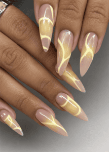 Pastel yellow swirl almond nails with abstract aura lines, glossy nude base and minimalist summer nail design