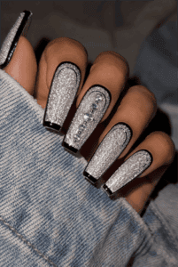 Silver sugar glitter coffin nails with black outline French tips, crystal rhinestone accent and textured glitter luxury nail design