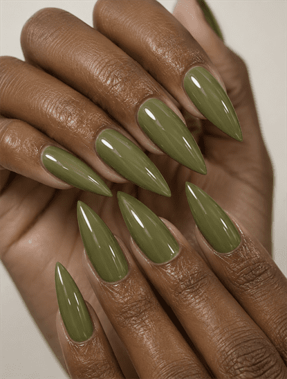 Glossy olive green stiletto nails with solid earthy polish, minimalist monochrome manicure and elegant fall nail design